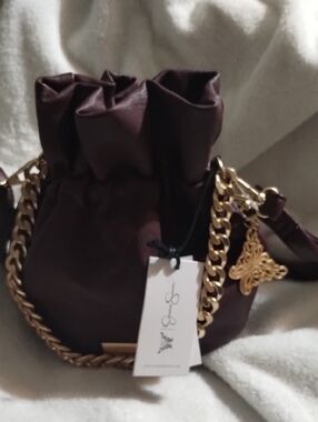 Jessica Simpson Burgundy Drawstring Pouch with Gold Chain